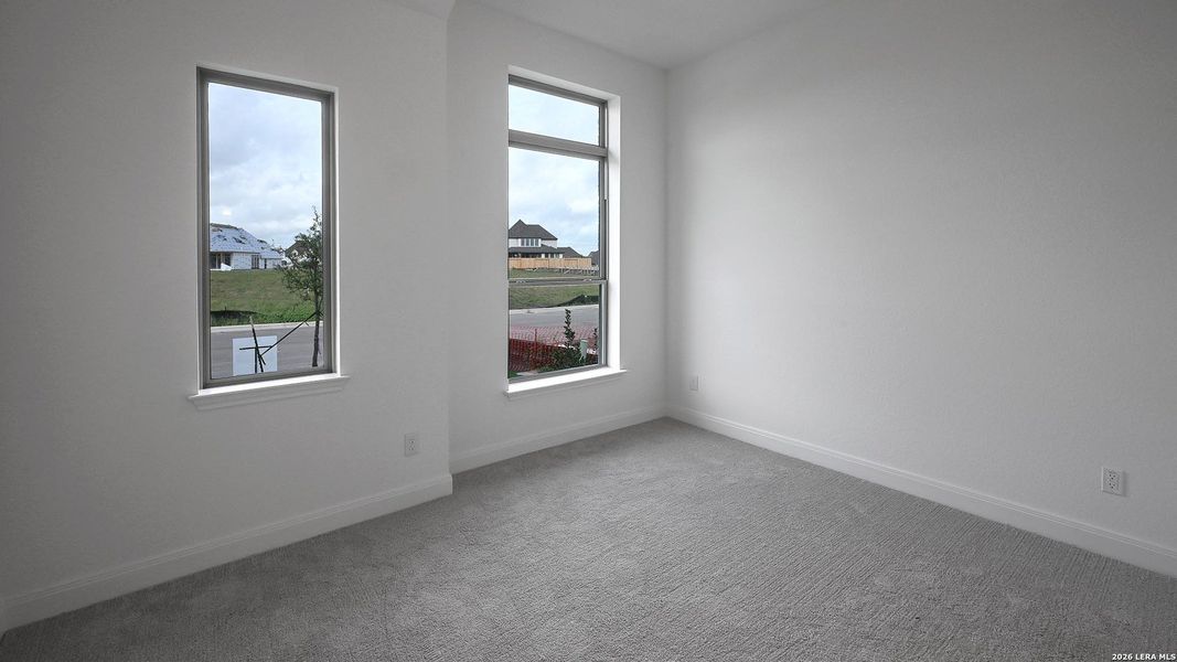 Spacious, unfurnished interior of a new home in Meadows of Mill Creek, Seguin (Image 17).