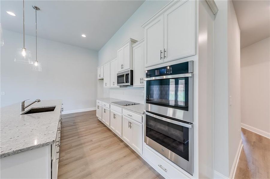 Furnished interior view inside a new home in , Homer (Image 9). Furnished interior view inside a new home in , Homer (Image 9).
