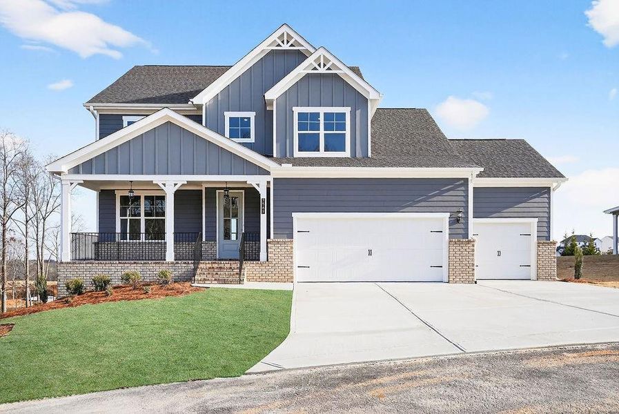 Front exterior of a new home in The Manor at Gainesville Township, Gainesville, GA, highlighting curb appeal (Image 16).