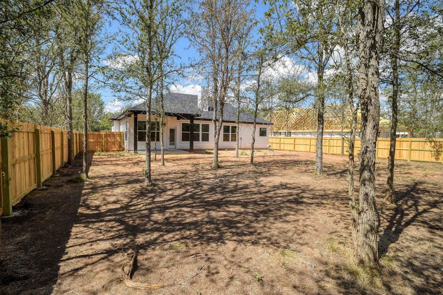Front exterior of a new home in , Bastrop, TX, highlighting curb appeal (Image 20).