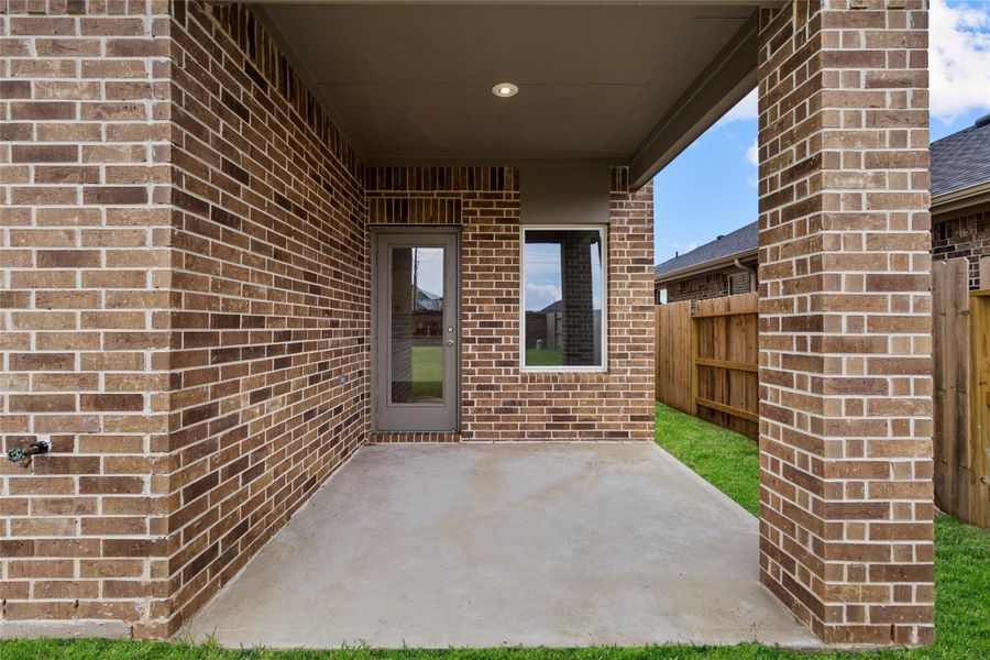 Exterior details and patio area of a home in Sunterra, Katy (Image 19). Exterior details and patio area of a home in Sunterra, Katy (Image 19).