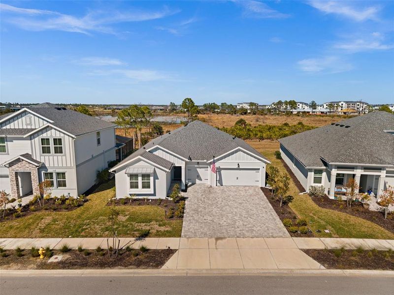 Front exterior of a new home in , Punta Gorda, FL, highlighting curb appeal (Image 22).