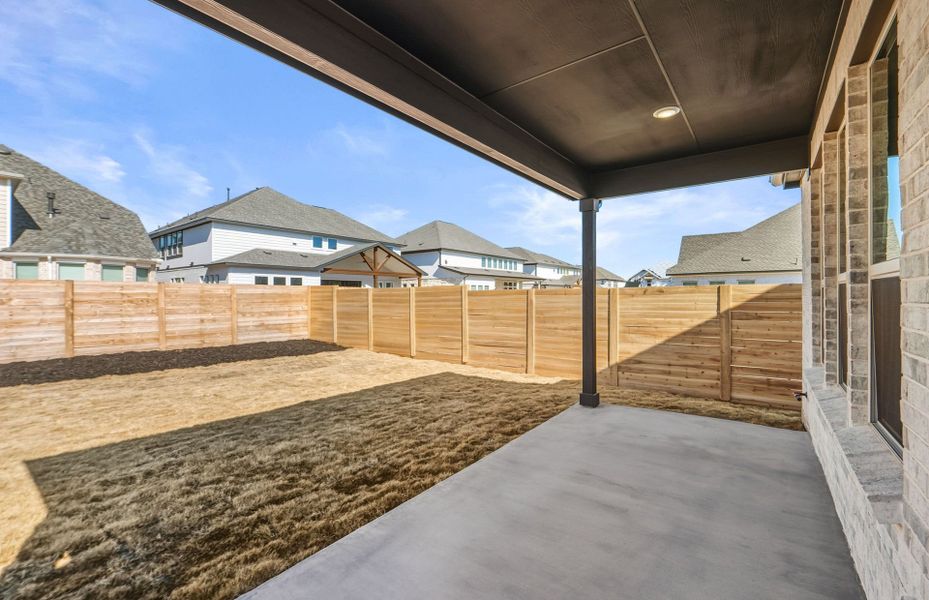 Exterior details and patio area of a home in Bluffview Reserve, Leander (Image 29). Exterior details and patio area of a home in Bluffview Reserve, Leander (Image 29).