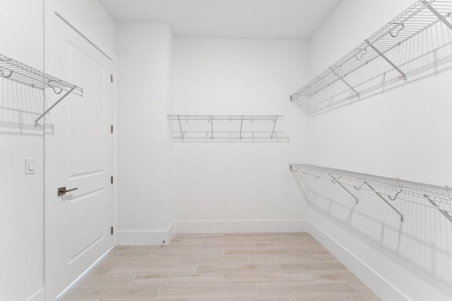 Primary Walk-in Closet Primary Walk-in Closet