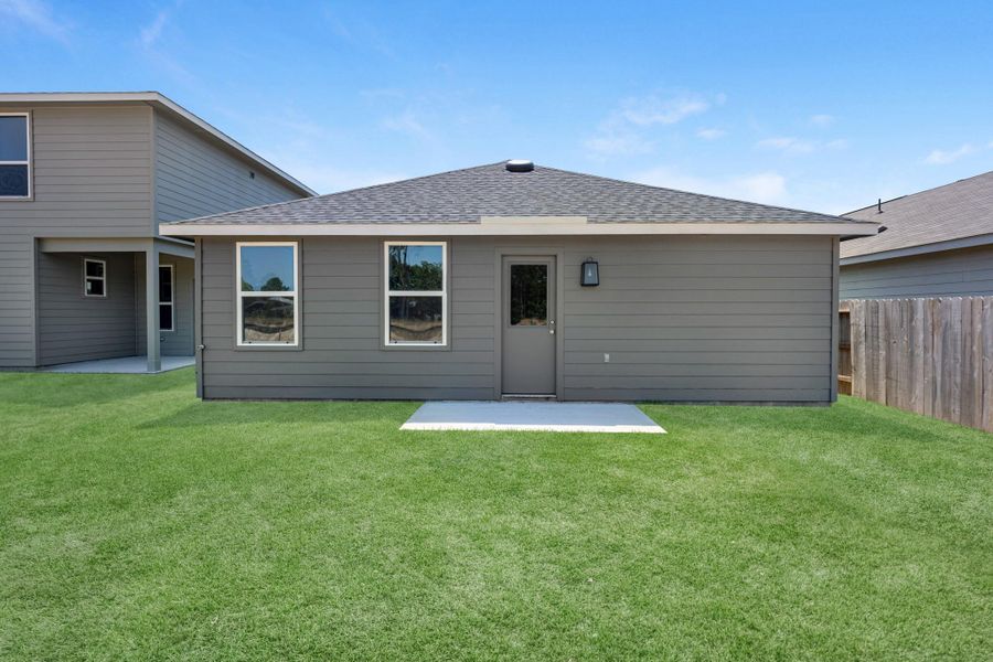 Exterior details and patio area of a home in The Enclave at Spring Branch, Conroe (Image 4).