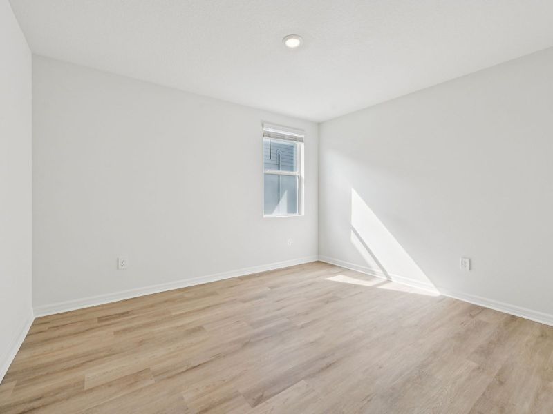 Spacious, unfurnished interior of a new home in Oakfield Trails - Premier Series, Parrish (Image 8).