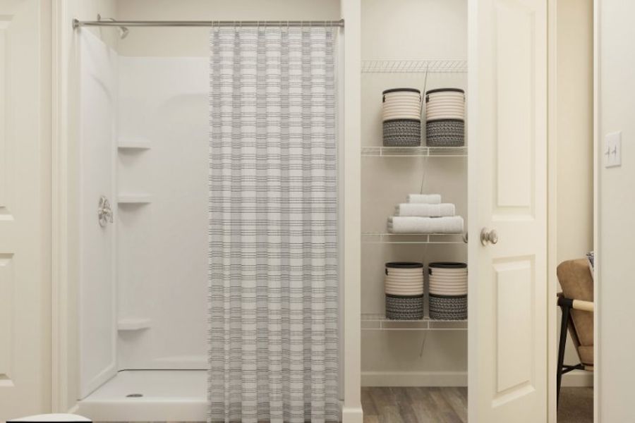 A shower with a glass door. A shower with a glass door.