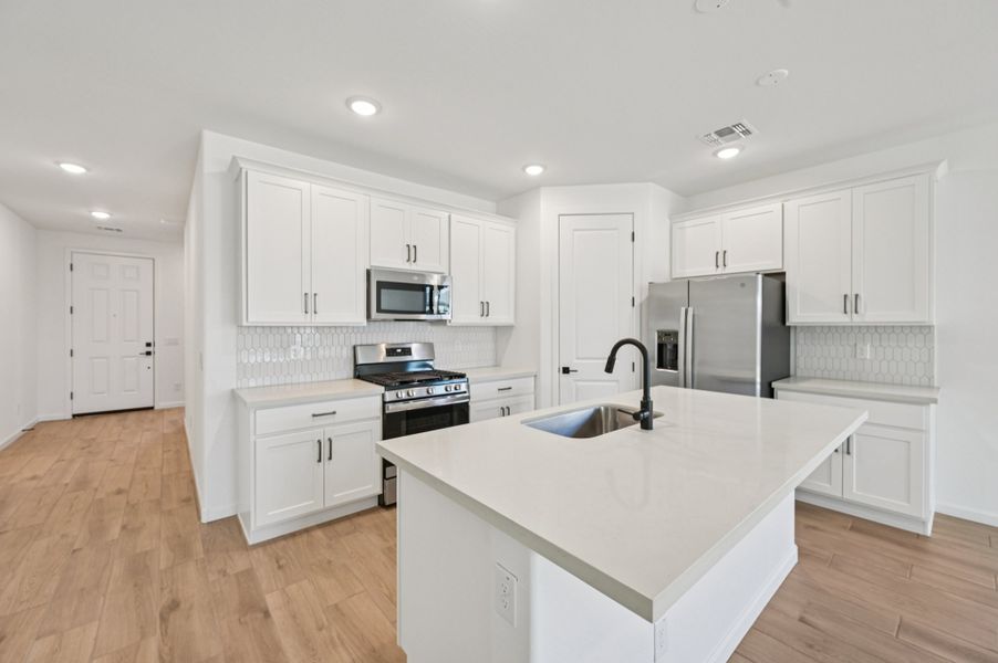 Kitchen featuring the Harmony Collection. Finishes and options may vary by community.