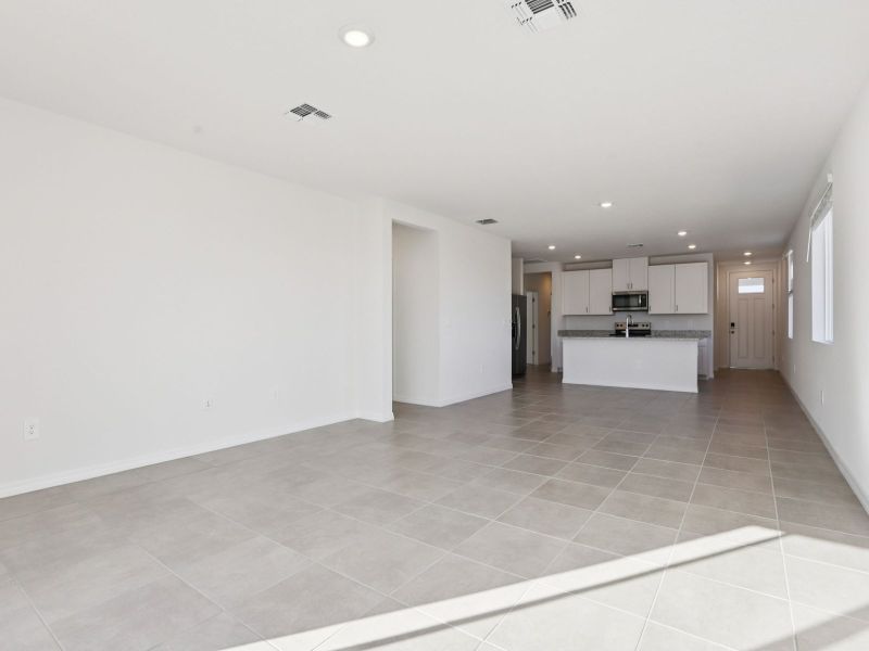 Spacious, unfurnished interior of a new home in Coasterra - Premier Series, Palmetto (Image 6).