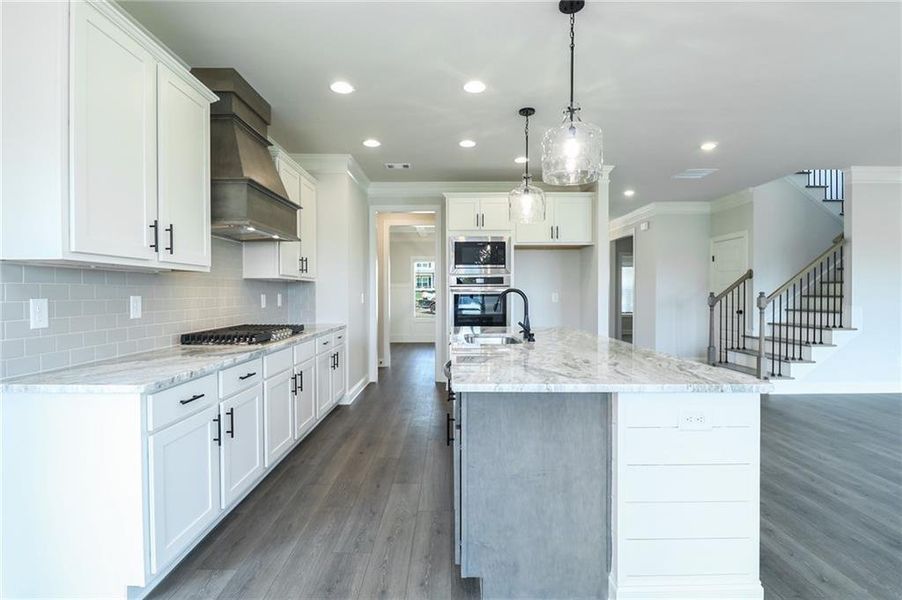 Furnished interior view inside a new home in Calgary Downs, Winder (Image 5).