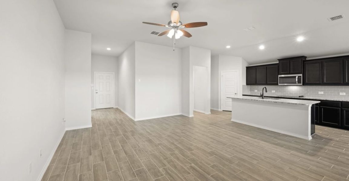 Representative exterior photo of a completed home built from the Pembridge II by Impression Homes in Mountain Valley, Burleson, TX (Image 11). Representative exterior photo of a completed home built from the Pembridge II by Impression Homes in Mountain Valley, Burleson, TX (Image 11).