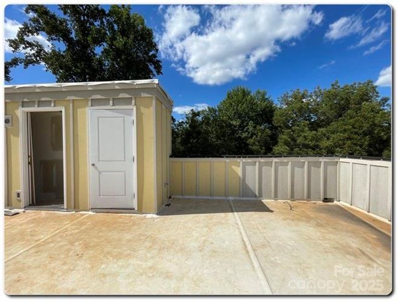 Exterior details and patio area of a home in , Charlotte (Image 2). Exterior details and patio area of a home in , Charlotte (Image 2).