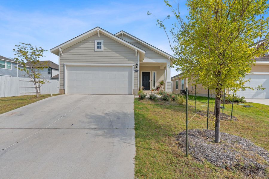 Front exterior of a new home in Harvest Ridge, Elgin, TX, highlighting curb appeal (Image 18).