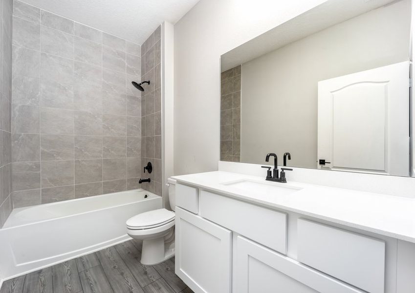 The spare bathroom has a large vanity ready for your guests to use