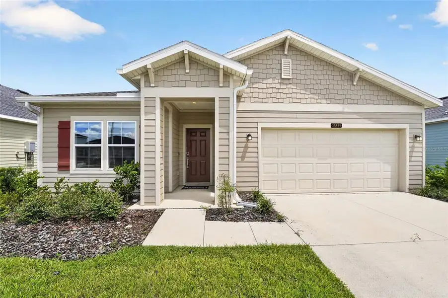 Front exterior of a new home in , Alachua, FL, highlighting curb appeal (Image 2). Front exterior of a new home in , Alachua, FL, highlighting curb appeal (Image 2).