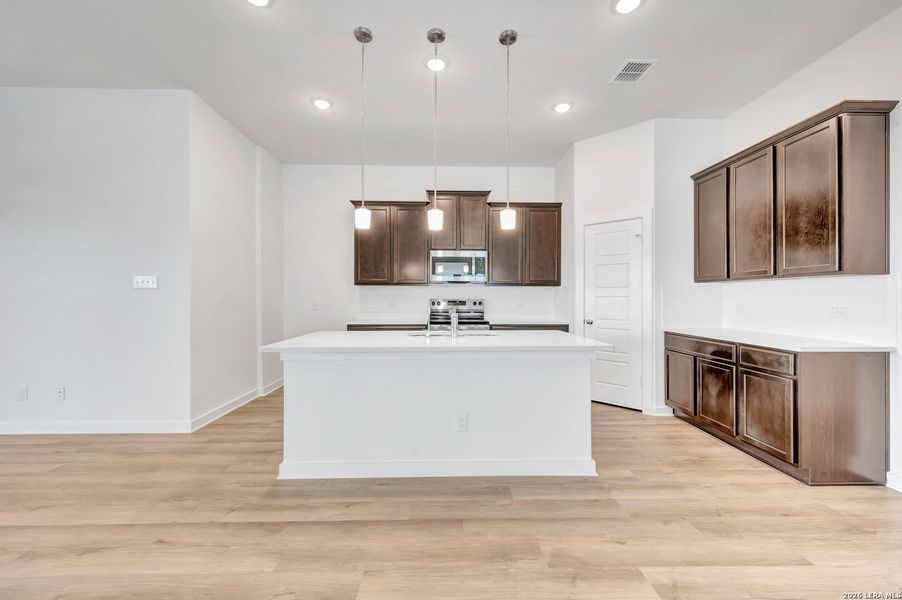 Furnished interior view inside a new home in Legacy Hills, San Antonio (Image 13).
