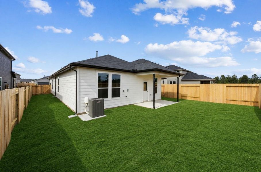 Exterior details and patio area of a home in Montgomery Bend, Montgomery (Image 4).