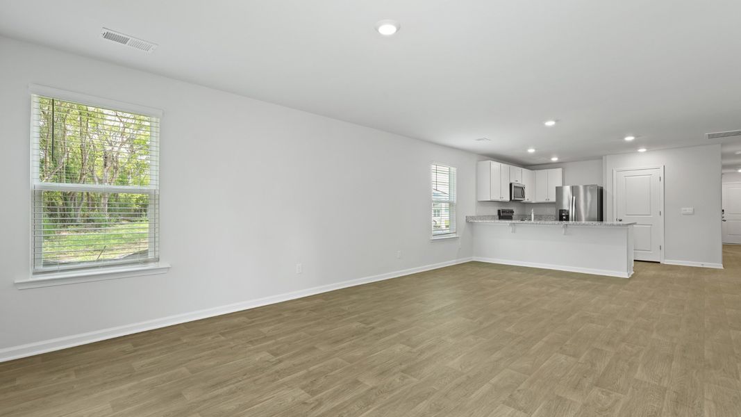 Spacious, unfurnished interior of a new home in Pine Hills at Cane Bay, Summerville (Image 9).