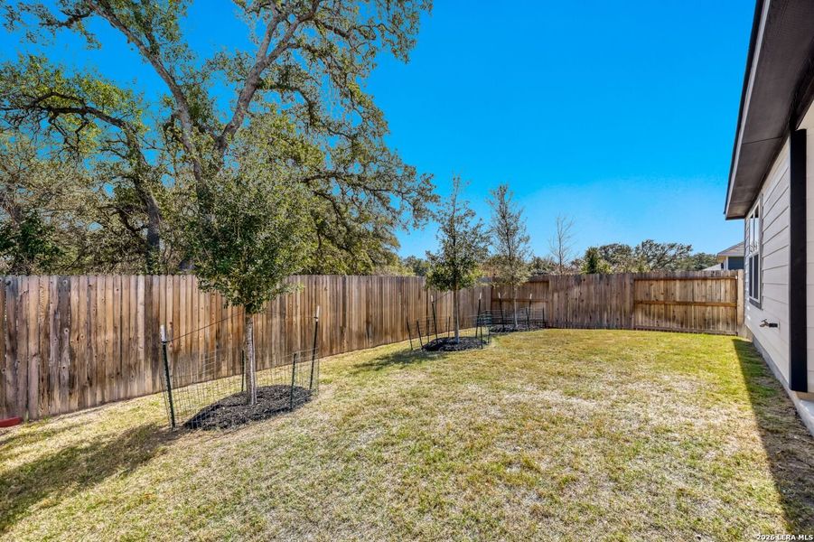 Exterior details and patio area of a home in Timber Creek, San Antonio (Image 4).