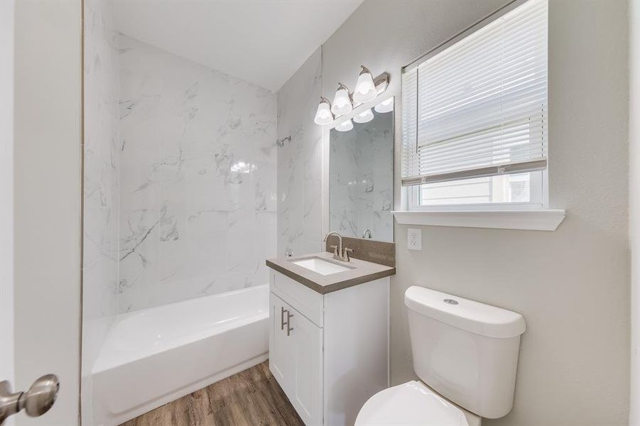 The second full bathroom is conveniently located on the second floor, ensuring easy access for both residents and guests. Every detail in this space has been carefully curated, reflecting a commitment to quality and design.