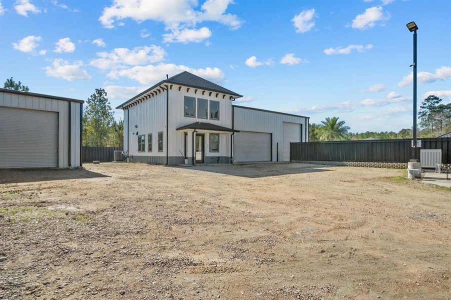 View of warehouses and garage apartment