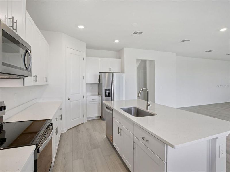 Furnished interior view inside a new home in Coasterra - Reserve Series, Palmetto (Image 7).
