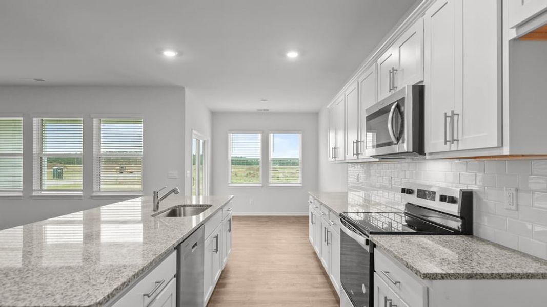 Furnished interior view inside a new home in East Ridge, Ayden (Image 7).