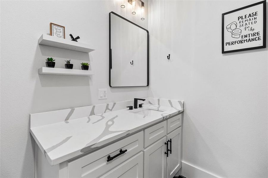 Ensuite bath with plenty of quartz counter space