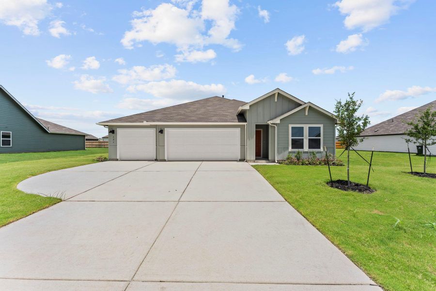 Front exterior of a new home in Hartland Ranch, Lockhart, TX, highlighting curb appeal (Image 1). Front exterior of a new home in Hartland Ranch, Lockhart, TX, highlighting curb appeal (Image 1).