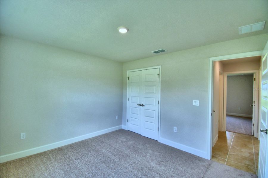 Spacious, unfurnished interior of a new home in Cadence Crossing, Auburndale (Image 29).