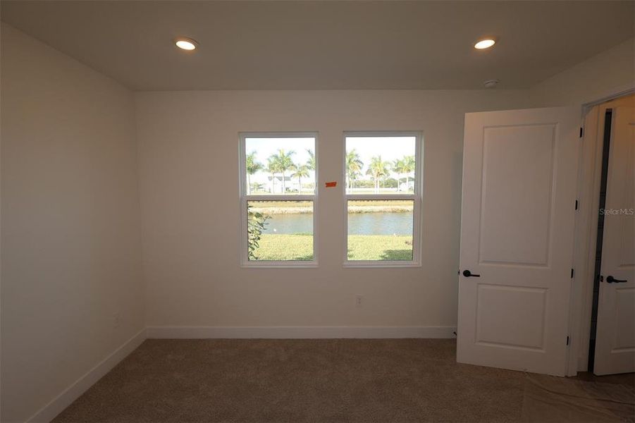 Spacious, unfurnished interior of a new home in Gracewater at Sarasota, Sarasota (Image 8).