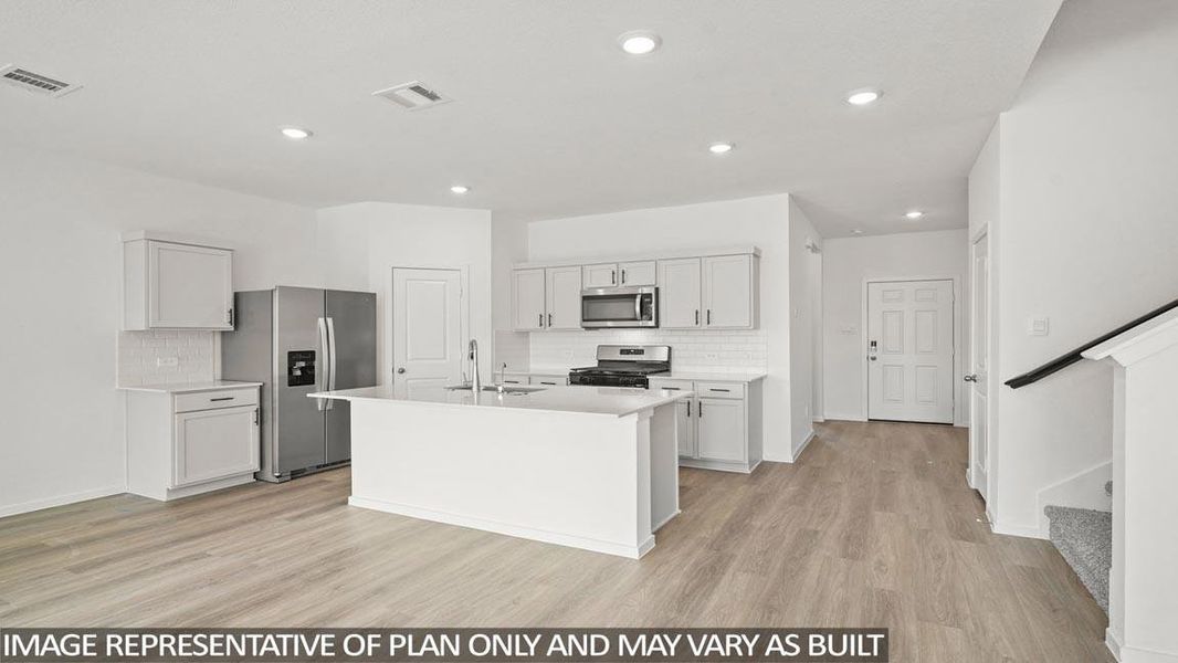 Furnished interior view inside a new home in Granger Pines, Conroe (Image 3).