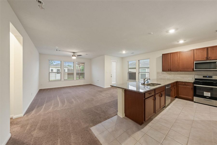 Furnished interior view inside a new home in Grace Landing, Willis (Image 5).