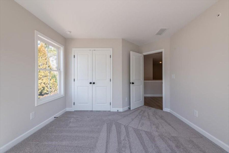 Spacious, unfurnished interior of a new home in Cherokee Township, Acworth (Image 32).