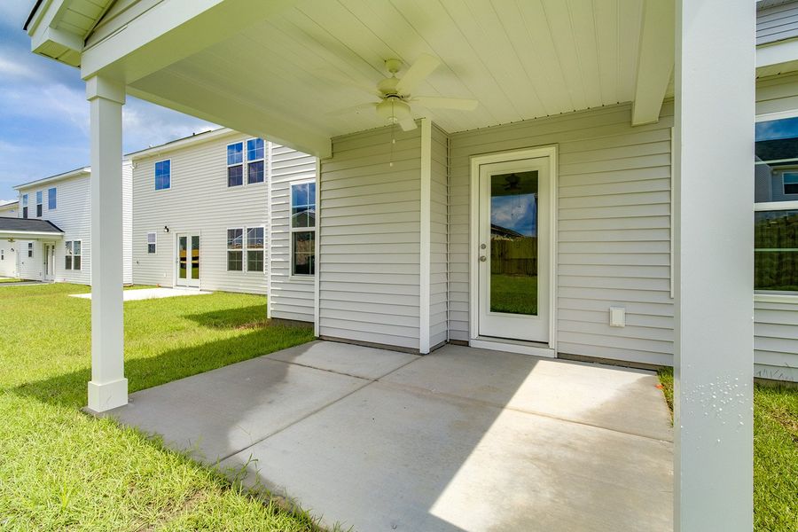 Front exterior of a new home in Winston Point, Gilbert, SC, highlighting curb appeal (Image 18). Front exterior of a new home in Winston Point, Gilbert, SC, highlighting curb appeal (Image 18).