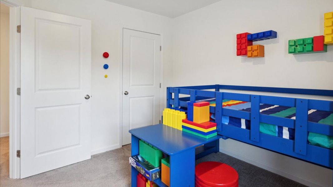 Representative furnished interior of a home built from the Altamont Townhome by D.R. Horton in Saint Marc's, Powell (Image 19).