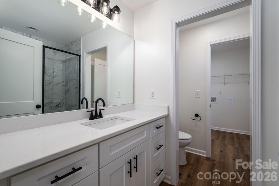 Primary Bathroom with private toilet area