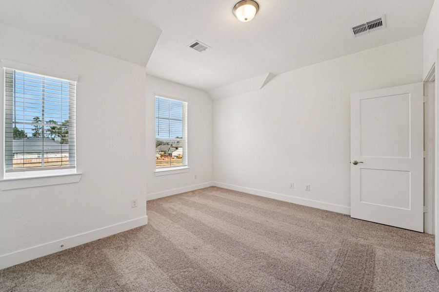Spacious, unfurnished interior of a new home in The Woodlands Hills, Willis (Image 13).
