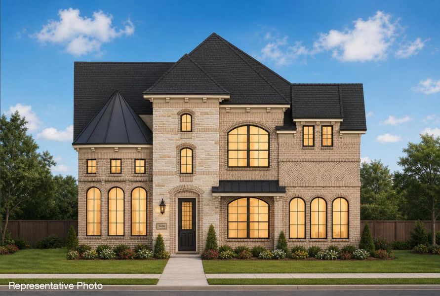 Representative exterior photo of a completed home built from the Royal Martinique by Grand Homes in Edgewater, Fate, TX (Image 16).