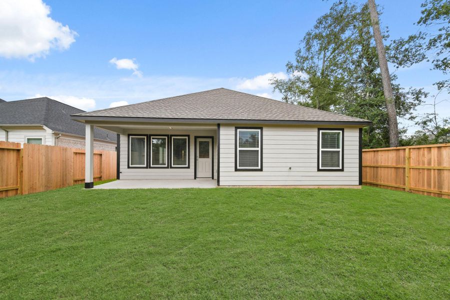 Front exterior of a new home in Barton Creek Ranch, Conroe, TX, highlighting curb appeal (Image 16). Front exterior of a new home in Barton Creek Ranch, Conroe, TX, highlighting curb appeal (Image 16).