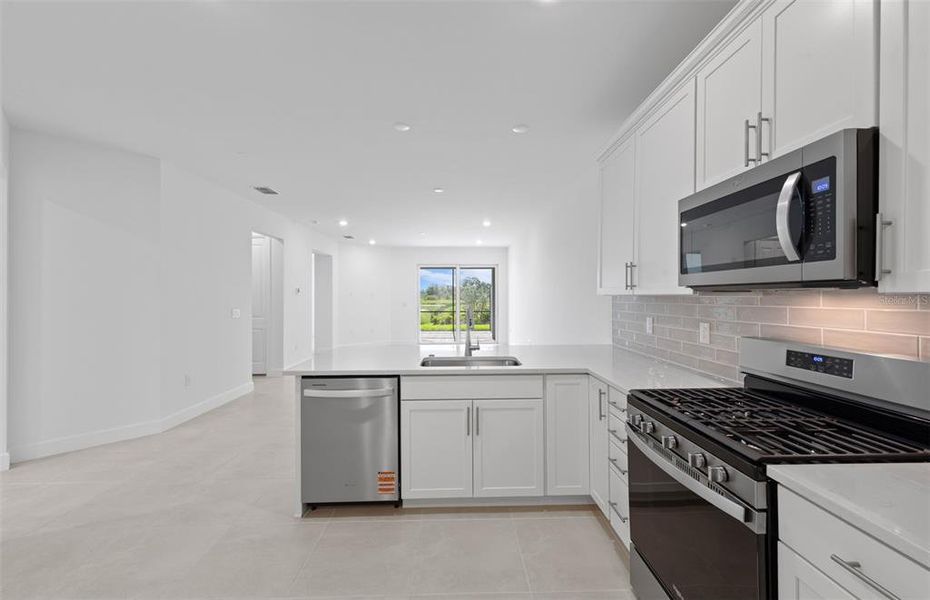 Furnished interior view inside a new home in BeachWalk by Manasota Key, Englewood (Image 8). Furnished interior view inside a new home in BeachWalk by Manasota Key, Englewood (Image 8).