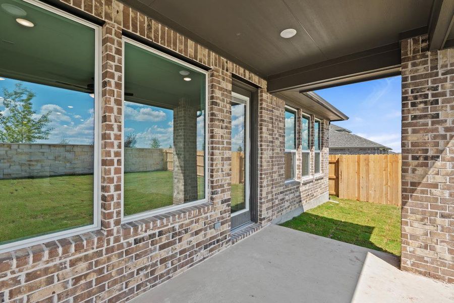 Exterior details and patio area of a home in Flora, Hutto (Image 25).