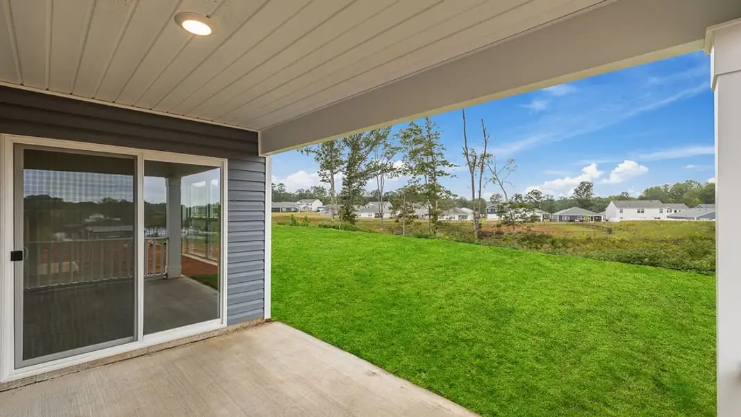 Exterior details and patio area of a home in Lakestone, Woodruff (Image 3).