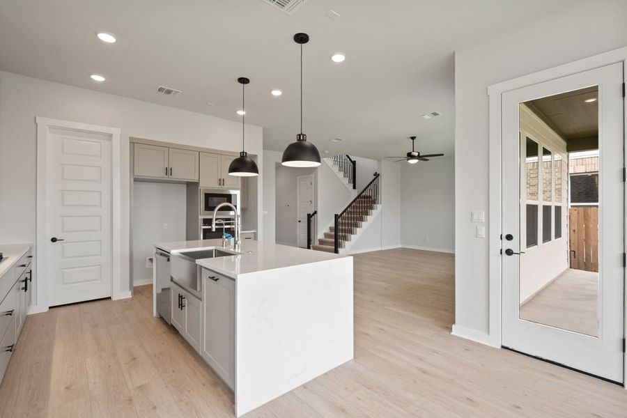 Furnished interior view inside a new home in Arbor Collection at Lariat, Liberty Hill (Image 8). Furnished interior view inside a new home in Arbor Collection at Lariat, Liberty Hill (Image 8).