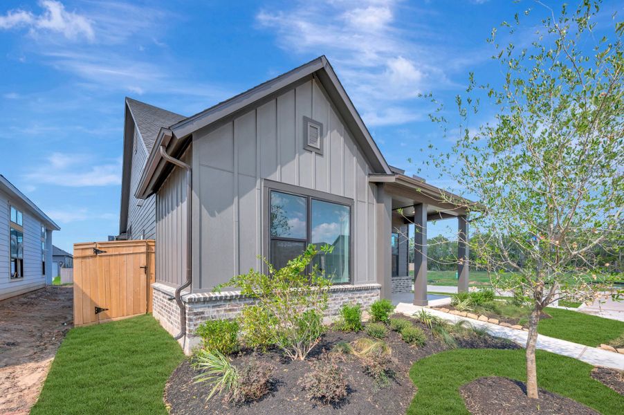 Exterior details and patio area of a home in Sienna - Landmark Row Collection, Missouri City (Image 3). Exterior details and patio area of a home in Sienna - Landmark Row Collection, Missouri City (Image 3).