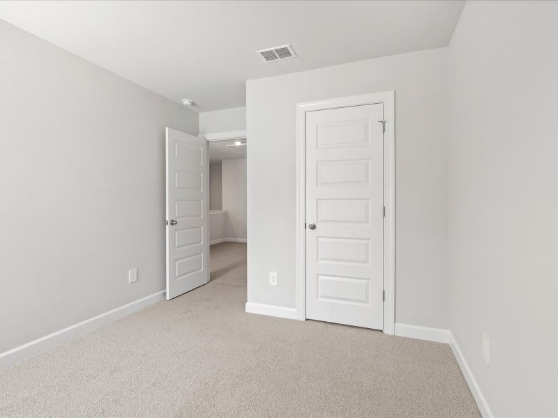 Spacious, unfurnished interior of a new home in Valentine Townes, Greer (Image 17).
