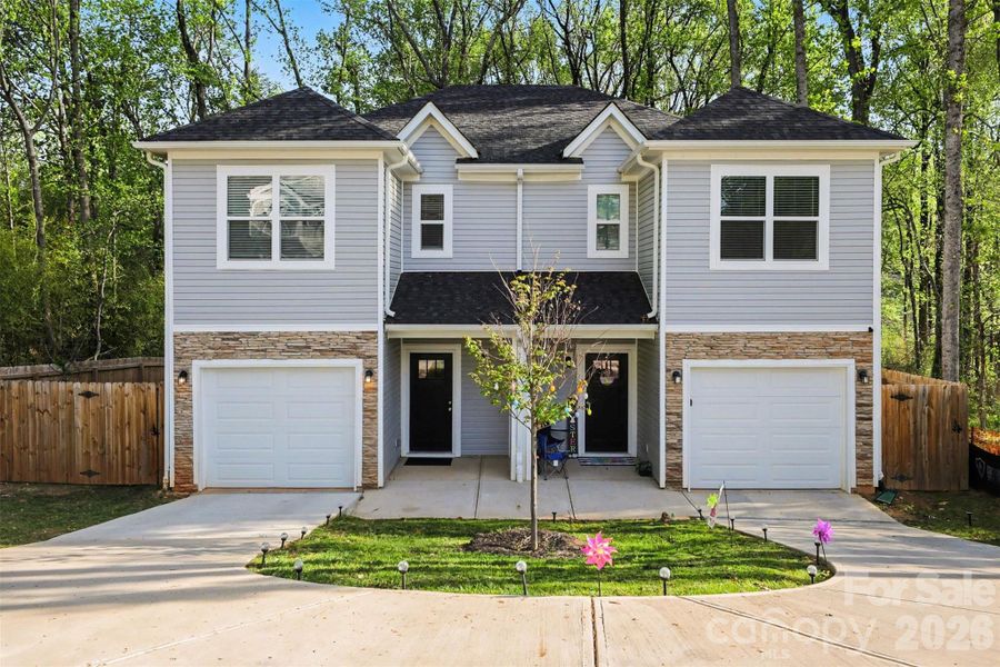 Front exterior of a new home in , Charlotte, NC, highlighting curb appeal (Image 15).