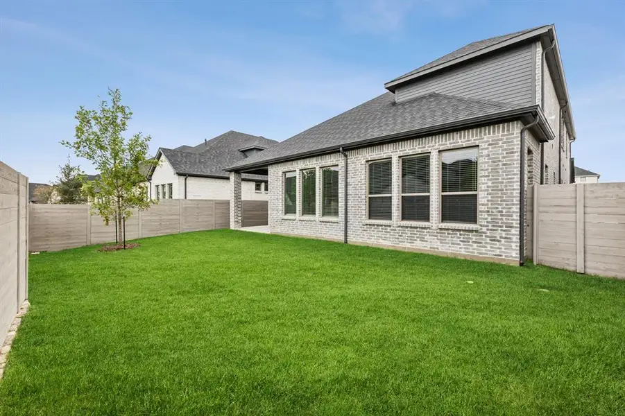 Covered Patio in the Matisse home plan by Trophy Signature Homes – REPRESENTATIVE PHOTO