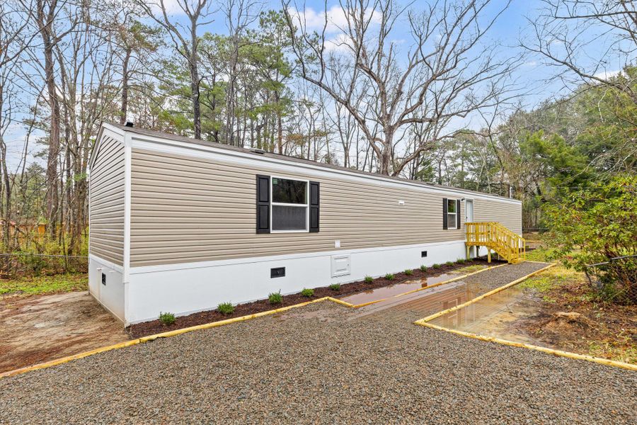 Exterior details and patio area of a home in , Summerville (Image 15).