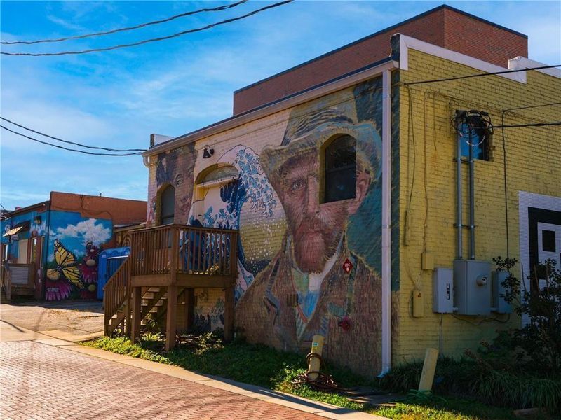 Front exterior of a new home in Stillwood, Hapeville, GA, highlighting curb appeal (Image 23).